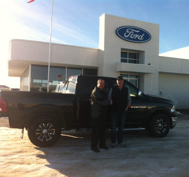 Legacy Auto Group Happy Customer with 2012 Ram 1500